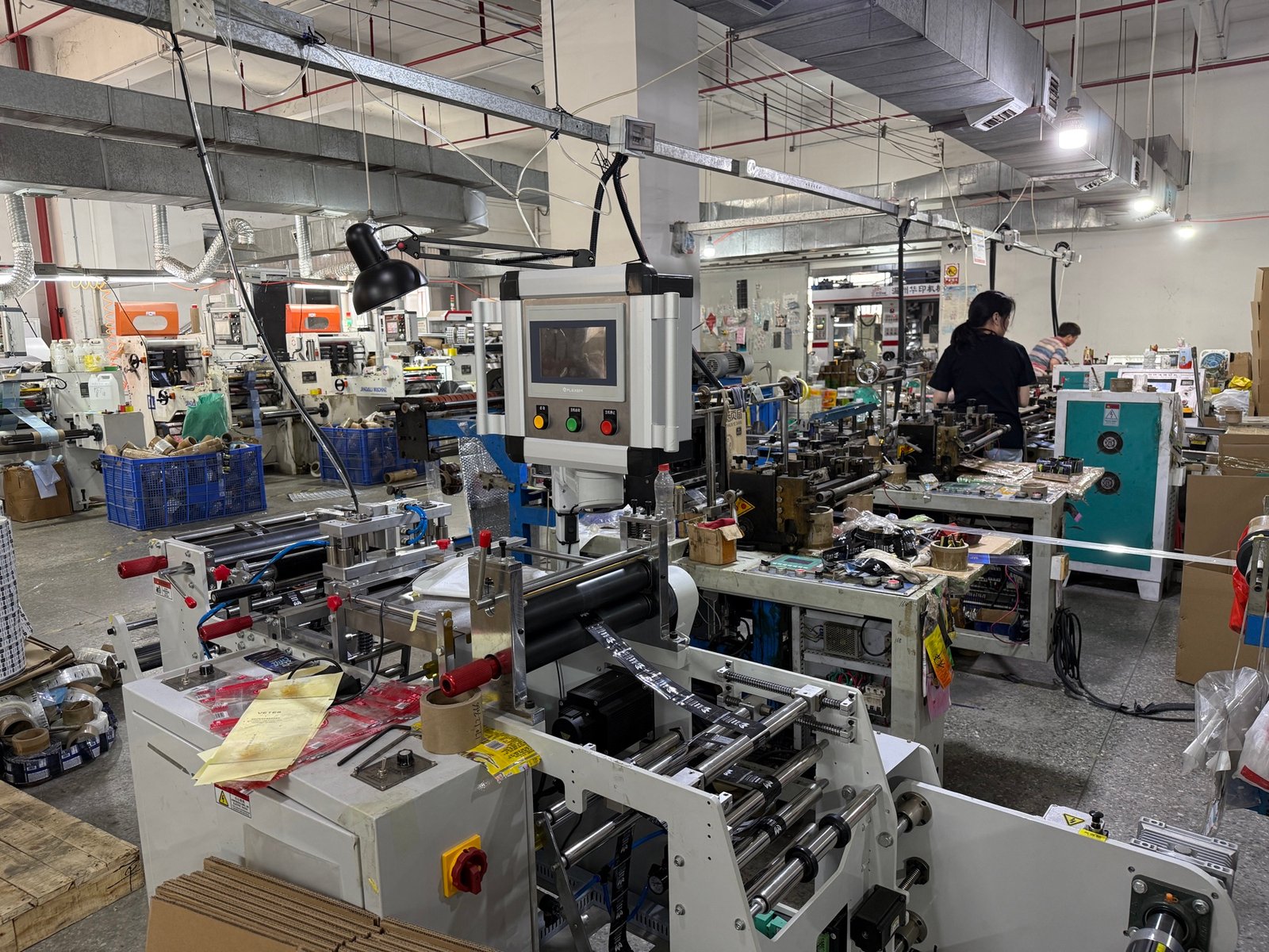 Post-press converting workshop for shrink sleeve label production